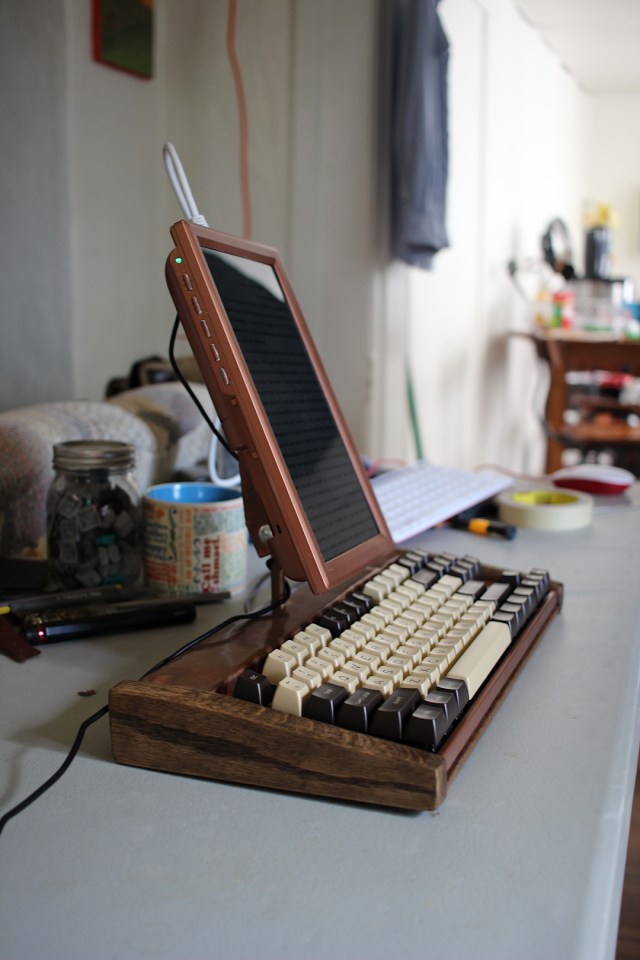 side view of word processor with vertical screen and keyboard